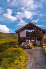 Wooden Hut Cabin in High Alpine Mountains as Summer