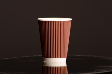 Paper coffee cup in coffee shop.
