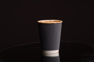 Paper coffee cup in coffee shop.