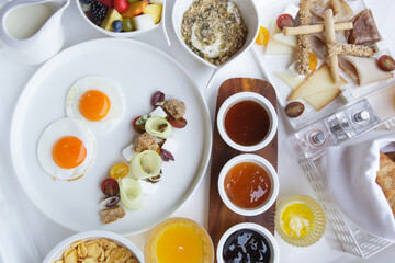 Breakfast in luxutry hotel with orange juice and various delicious choices of food.
