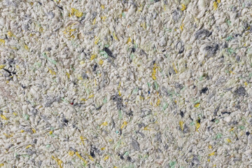 Abstract textured wallpaper. Decorative texture. Colored texture of liquid wallpaper to cover wall surface. Colored abstract background. Abstract texture of decorative plaster liquid wallpaper