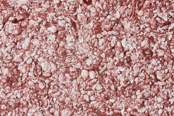 Abstract textured wallpaper. Decorative texture. Colored texture of liquid wallpaper to cover wall surface. Colored abstract background. Abstract texture of decorative plaster liquid wallpaper