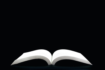 open book on black background. with copy space