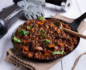 Fitness meal for dinner or lunch with a delicious stew with lentils, chicken breast and vegetables.