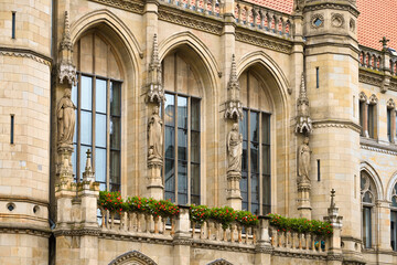 Obraz premium Town Hall in Braunschweig, Lower Saxony, Germany. Neo-Gothic City Hall, Gothic Revival architecture. Old town in Brunswick, Germany. 