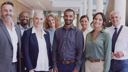 Group of successful business people showing thumbs up - Powered by Adobe