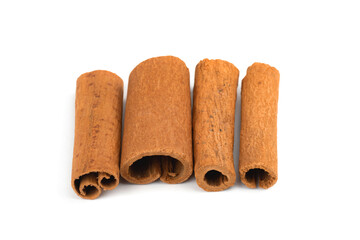 Pile of cinnamon sticks isolated on a white background photo