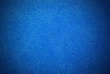 Blue background with sequins. Blue foamiran with grainy texture and vignette.

