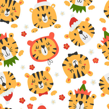 Seamless pattern with cute tigers .