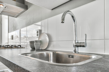 Close up of elegant sink in luxury kitchen