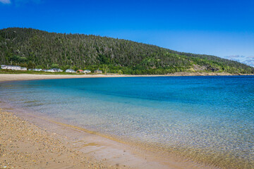 View on the turquoise waters of St Lawrence river in Godbout, a small village of Cote Nord, in Quebec (Canada)