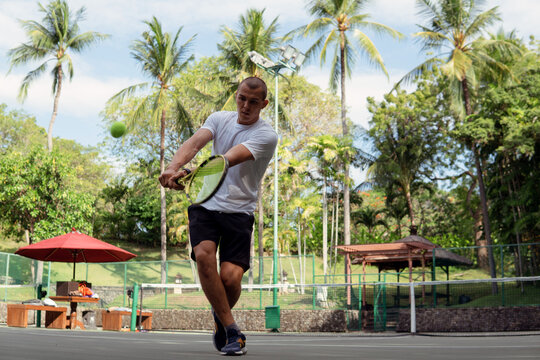 Man In White And Black Sportwear Playing Tennis