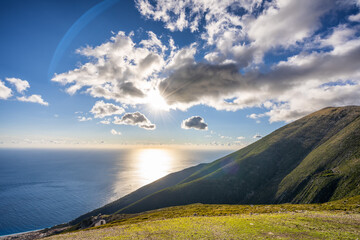 Sea landscape with mountains and clouds in Albania.