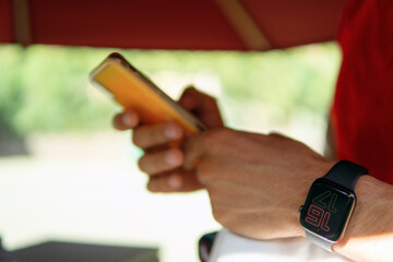 the man looks at the phone