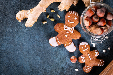 Christmas frame with gingerbread cookies. Christmas cookies, nuts and spices. Copy space for text. Winter holidays background mock up. New year composition. New year 2022