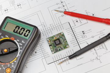 Image sensor and multimeter on a schematic diagram