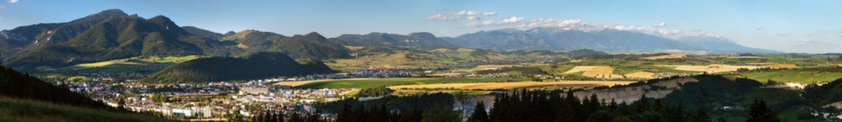 Ruzomberok town and carpathian mountains panoramic view