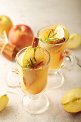 Warm apple autumn drink with cinnamon