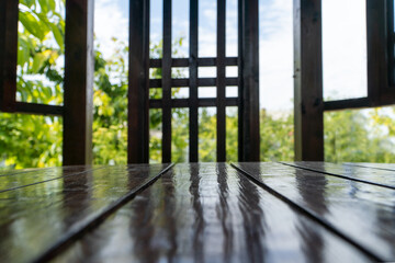 Empty wooden table and blurred view of someone. Background for your product.