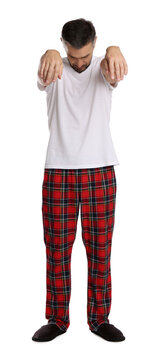 Man in sleepwalking state on white background
