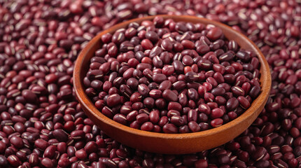 Raw adzuki red bean as background with spoon.