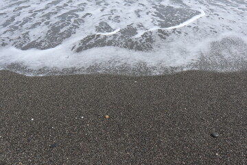 white bear waves and black sand beach with sunset design for freedom concept