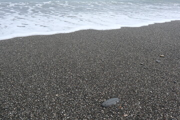 white bear waves and black sand beach with sunset design for freedom concept