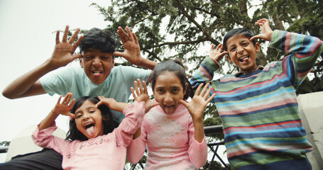 Cheerful kids from Ina fooling around, having fun