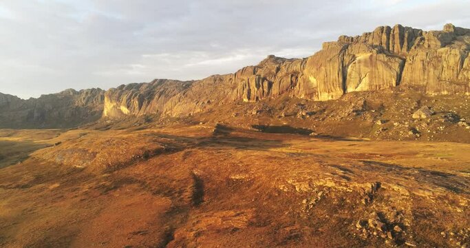 Aerial view on rocky mountains during sunrise in Madagascar