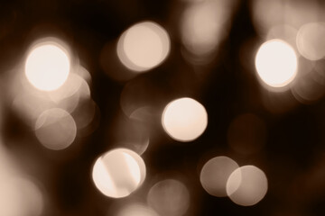 Obraz premium Blurred lights brown background. Abstract bokeh with soft light