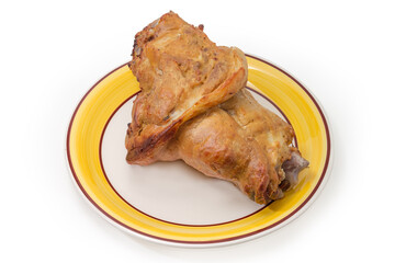 Baked ham hock on dish on a white background