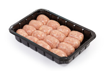 Raw short thick chicken sausages in the plastic food packing