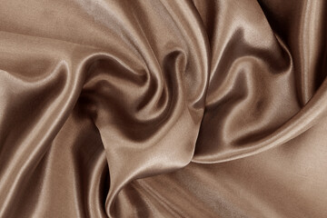 Dark brown fabric texture background, detail of silk or linen pattern.