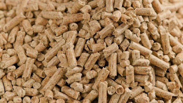 looped close-up rotation of compacted wooden sawdust pellets