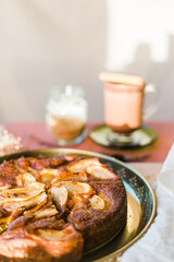 Close up of an apple pie with hot cocoa. Vertical orientation with copy space