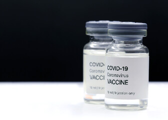 Ampoules with COVID-19 coronavirus vaccine, sars-cov-2 pandemic