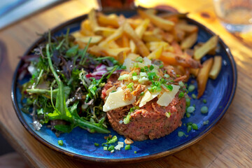 Tartare steak and French fries 