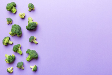 Top view fresh green broccoli vegetable on Colored background. Broccoli cabbage head Healthy or vegetarian food concept. Flat lay. Copy space