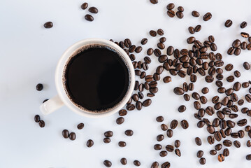 Coffee Cup and Roasted Coffee Beans on White Isolated Background,  Closeup of Grain Coffee Ingredients With Hot Coffee Cup Backgrounds.