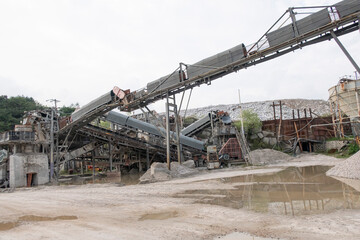 Fototapeta na wymiar Conveyor line of the rock crushing and screening equipment.