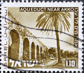 Israel circa 1973: A post stamp printed in Israel showing a Landscapes of Israel Aqueduct near Akko