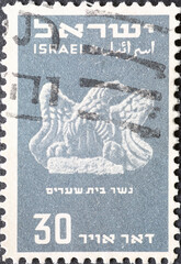 Israel circa 1950: A post stamp printed in Israel showing an Eagle From Beit-She’arim, Stone Sculpture. Airmail