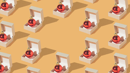 Creative and minimal New Year engagement concept with jewelry box and bright red Christmas baubles on sand coloured background. Trendy Vintage aesthetic pattern with copy space.