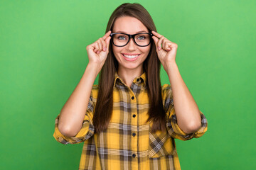 Photo of satisfied glad person hands touch glasses look camera isolated on green color background