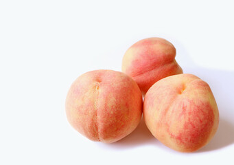 Three of Fresh Ripe Peaches Isolated on White Backdrop