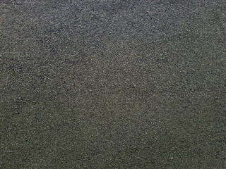 Dry gray, natural material, atmospheric impact, outdoors. Background cracked, horizontal close-up photo. Background of stone wall texture photo