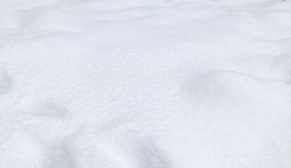 White snow surface with smooth bumps