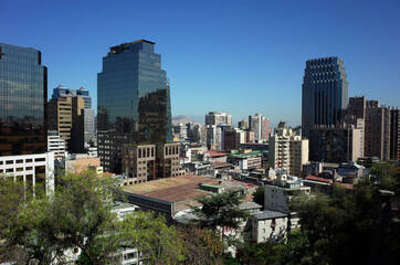 Fototapeta na wymiar Santiago, Chile - 26 November, 2018: Modern buildings of city center viewed from Santa Lucia Hill