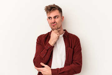 Young caucasian man isolated on white background suffers pain in throat due a virus or infection.