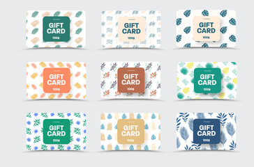 Mockup of vector gift cards isolated on white background with small tropical designs, exotic twigs, plates.